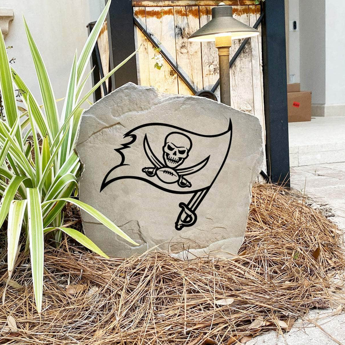 Engraved Tampa Bay Buccaneers Logo Stone featuring the official Buccaneers emblem, bringing football pride and timeless style to walkways, landscape beds, patios, and outdoor gathering areas.