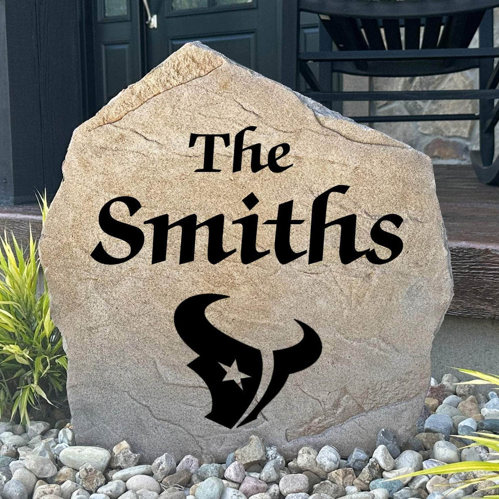 Officially licensed Houston Texans Name Stone featuring a personalized family name and the iconic Houston Texans logo engraved directly into the stone surface. This custom garden stone adds NFL team pride and curb appeal to front yards, patios, gardens, and entryways