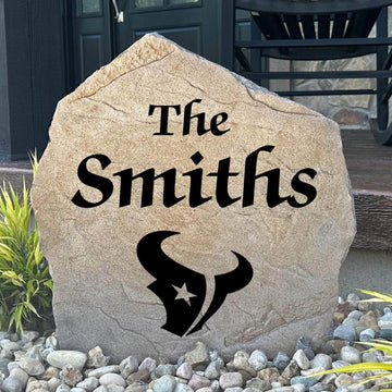 Officially licensed Houston Texans Name Stone featuring a personalized family name and the iconic Houston Texans logo engraved directly into the stone surface. This custom garden stone adds NFL team pride and curb appeal to front yards, patios, gardens, and entryways