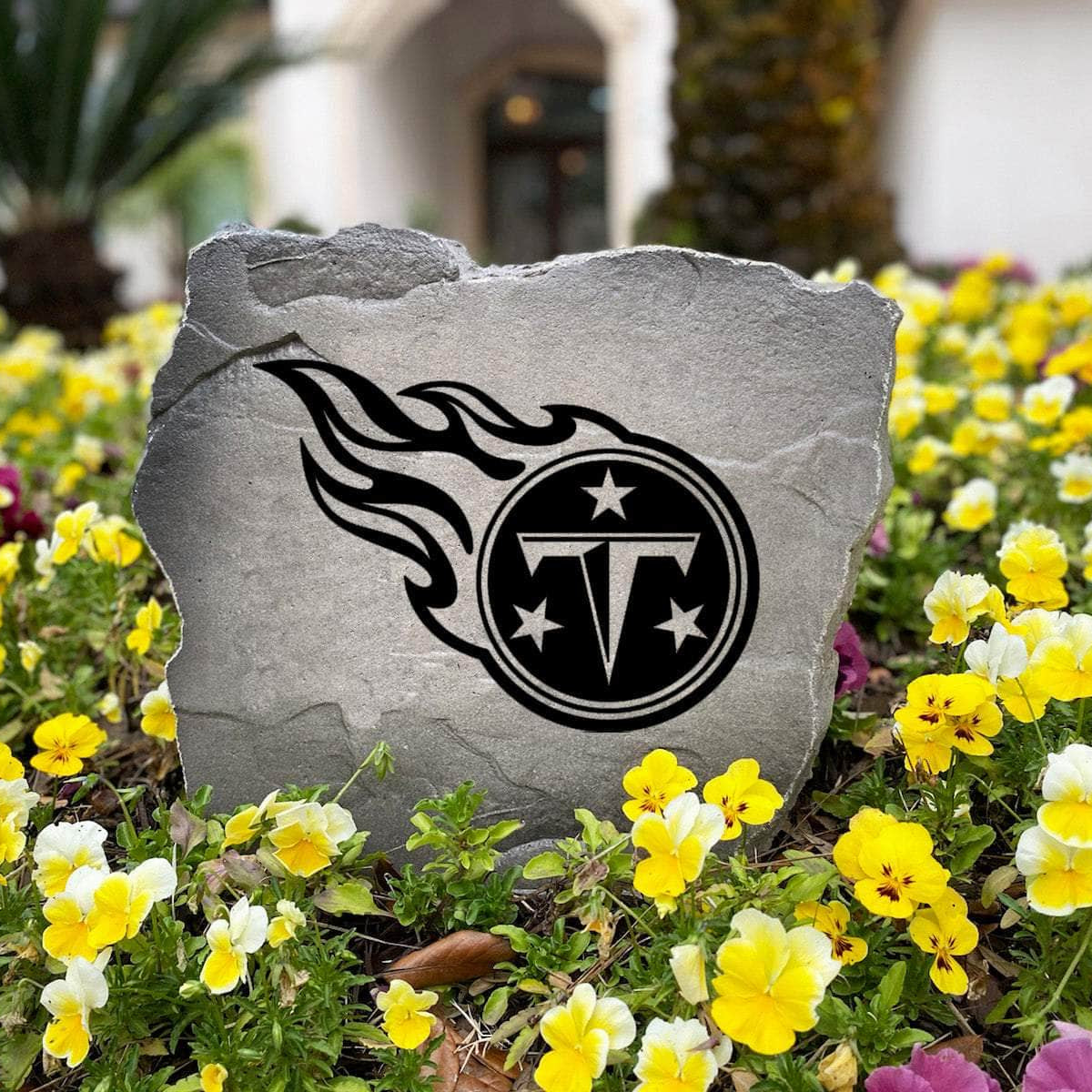 Officially licensed Tennessee Titans Logo Stone handcrafted in the USA with detailed team engraving and weather-resistant durability. This decorative garden stone enhances outdoor spaces with lasting beauty and NFL team pride.