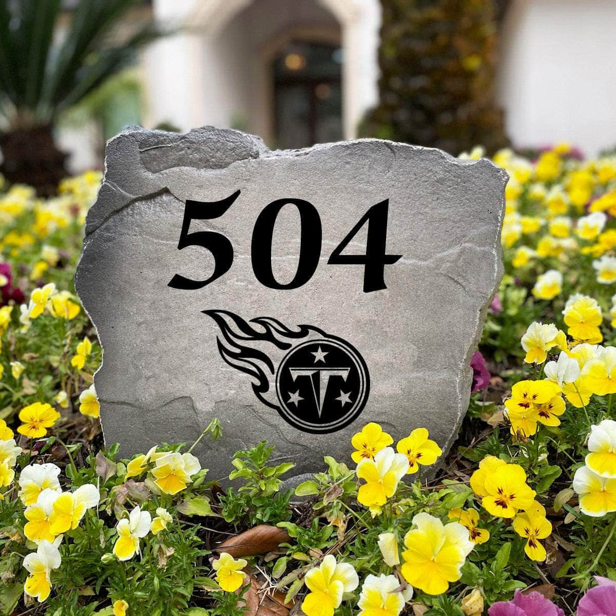 Officially licensed Tennessee Titans Address Stone handcrafted in the USA with custom house numbers and durable engraved artwork. This weather-resistant address marker provides lasting beauty and curb appeal for football fans.
