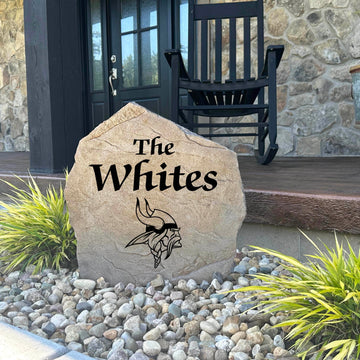 Decorative Minnesota Vikings Name Stone featuring personalized family names permanently engraved into the stone surface alongside officially licensed team graphics. Perfect for gardens, patios, and entryways, this outdoor accent celebrates Vikings football tradition.