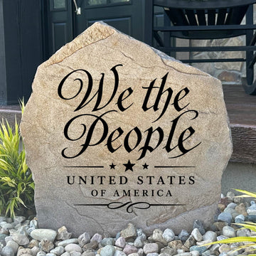 Patriotic We The People Stone featuring the opening words of the U.S. Constitution engraved into premium stone. This decorative landscape stone celebrates American heritage, freedom, and the founding principles of the United States.