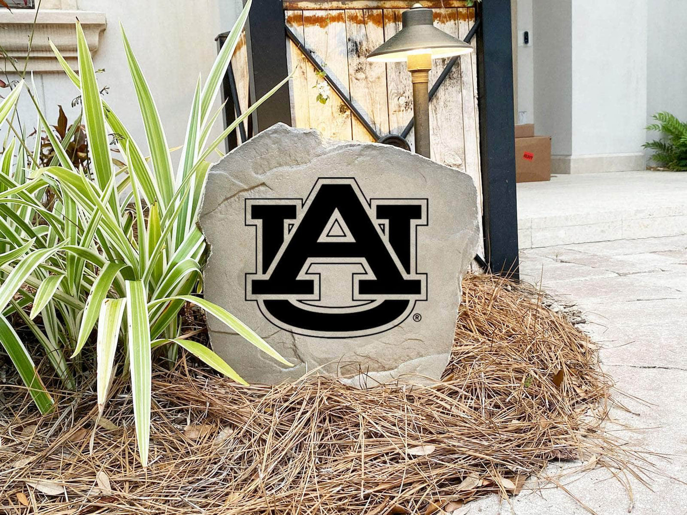 Engraved Auburn University logo stone for front yard display
