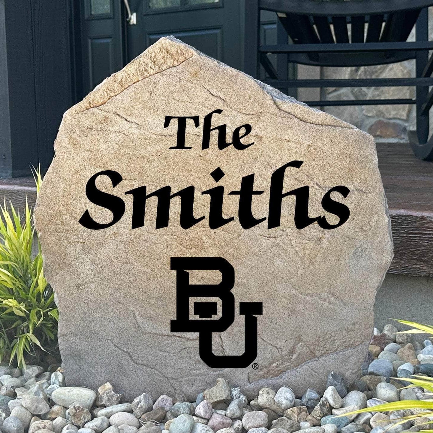 Officially licensed Baylor University Name Stone featuring a personalized family name and the iconic Baylor Bears logo engraved directly into the stone surface. This custom engraved garden stone adds school pride and curb appeal to front yards, patios, gardens, and entryways.