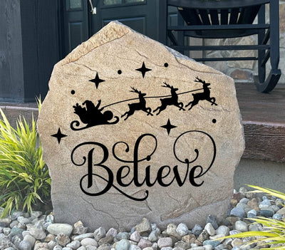 Holiday stone with Santa sleigh and Believe script