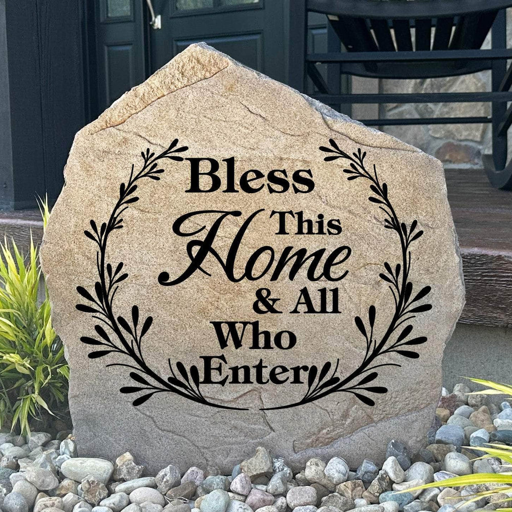 Engraved Bless This Home & All Who Enter Stone featuring a heartfelt message carved directly into the stone surface. This decorative garden stone adds warmth, faith, and timeless curb appeal to front yards, patios, gardens, and entryways.