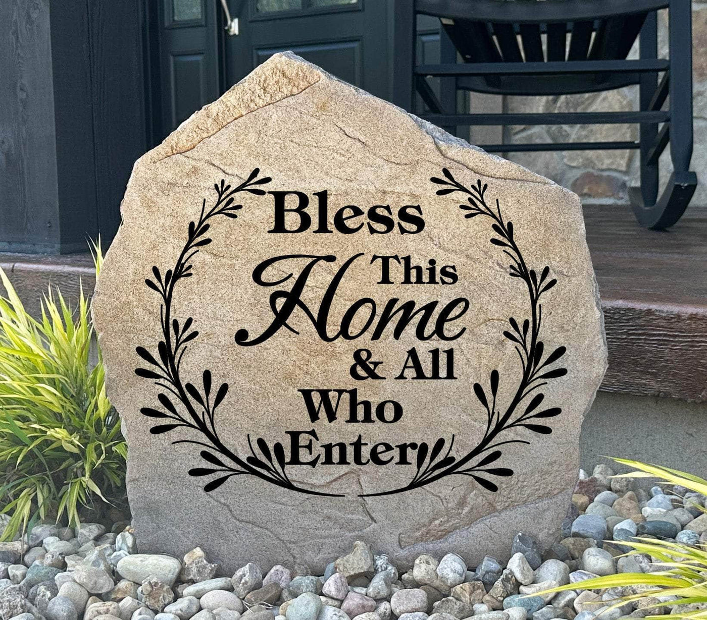 Engraved stone featuring “Bless This Home & All Who Enter”