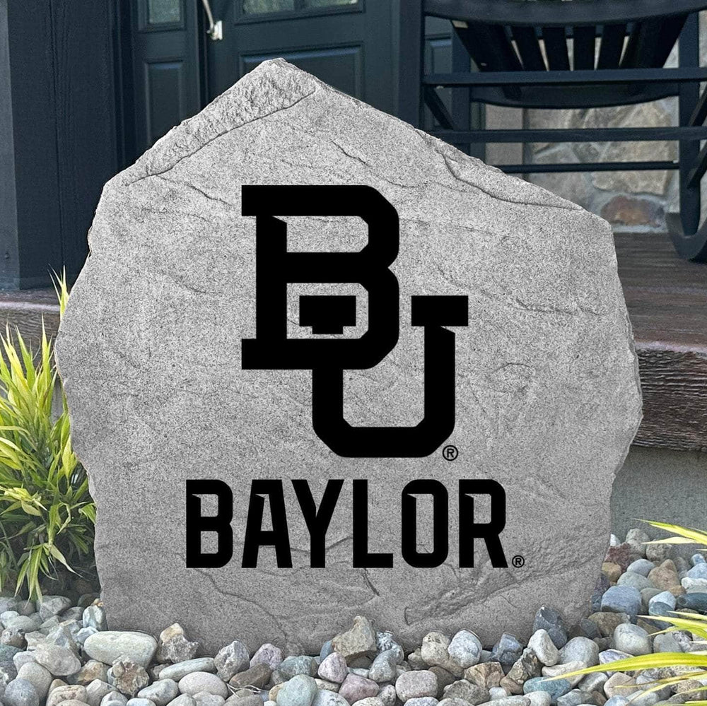 Custom Baylor University Logo Stone displayed in a landscaped flower bed, showcasing officially licensed Baylor Bears artwork with permanent engraving. This decorative outdoor stone creates a beautiful focal point for alumni homes and Baylor fans.