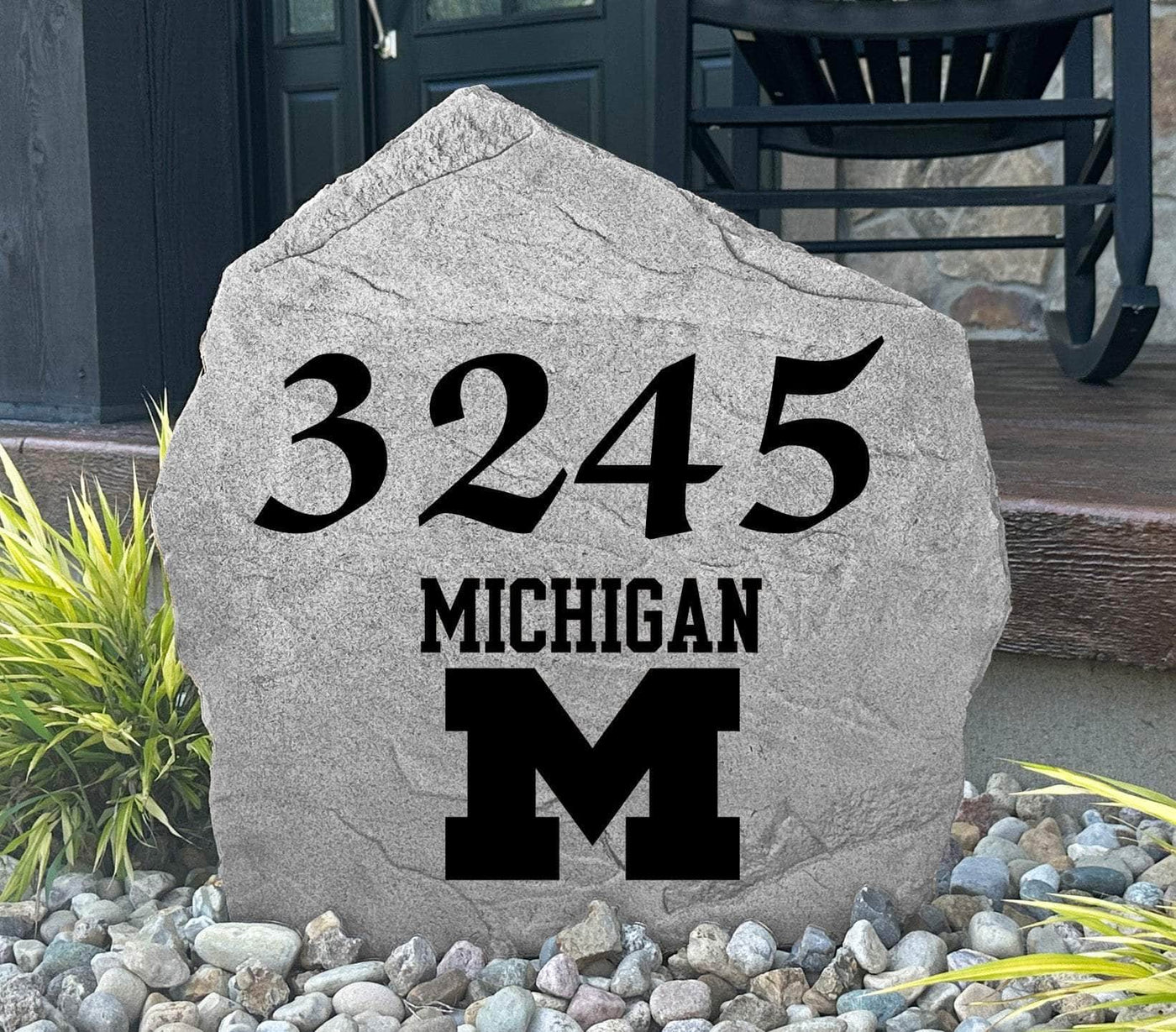 Custom engraved rock featuring Michigan Wolverines branding and home address.