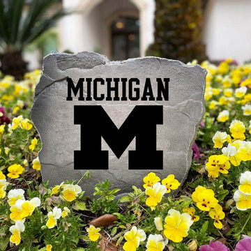 Officially licensed Michigan Wolverines Logo Stone handcrafted in the USA with detailed team engraving and durable construction. This decorative garden stone enhances landscape beds and outdoor spaces with lasting beauty and school spirit.