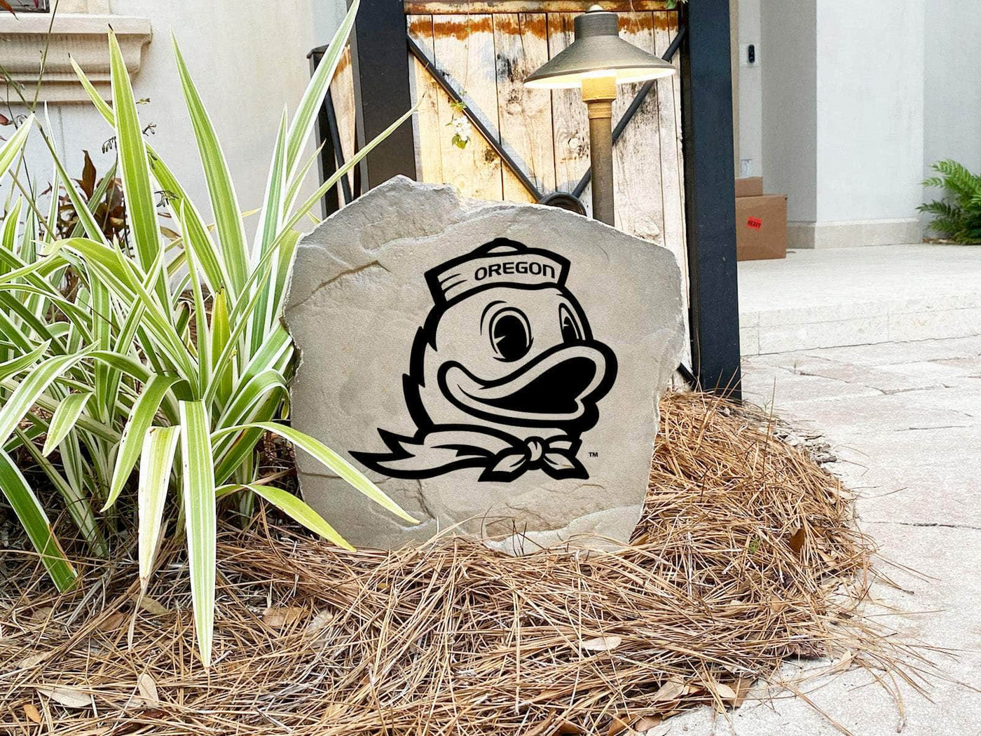 Engraved college mascot stone showcasing the Oregon Duck in sailor hat.