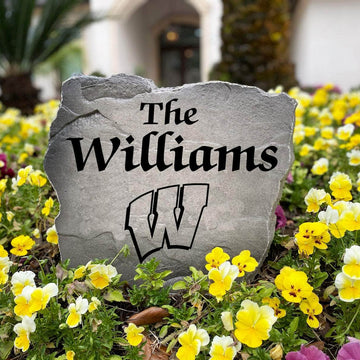 Officially licensed Wisconsin Badgers Name Stone handcrafted in the USA with custom family engraving and detailed team artwork. This decorative garden stone enhances landscape beds, patios, and outdoor living spaces with lasting beauty and school spirit.