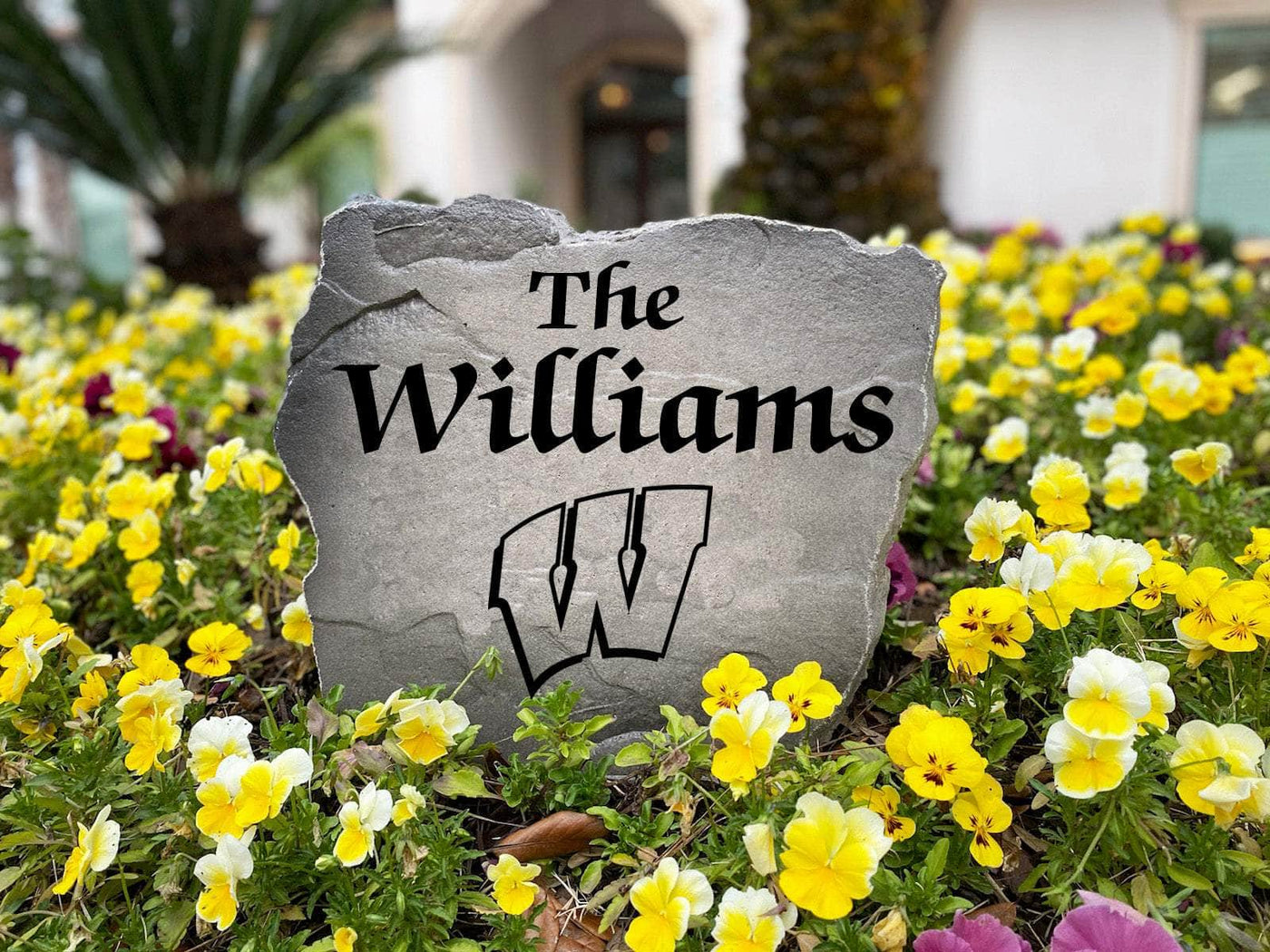 College team name rock ideal for alumni and sports lovers’ outdoor décor.