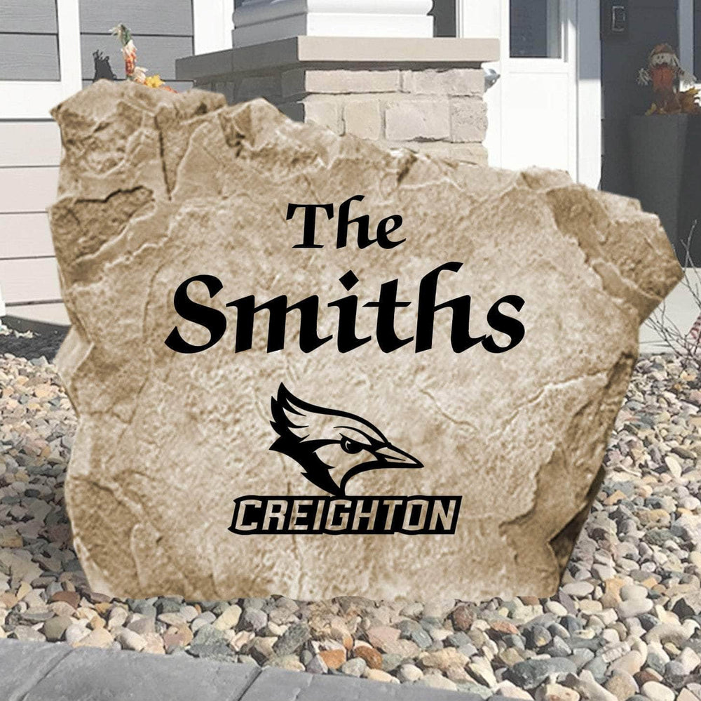 Personalized Creighton University Name Stone engraved with your family surname, creating a distinguished Bluejays-inspired centerpiece for your home's landscape.