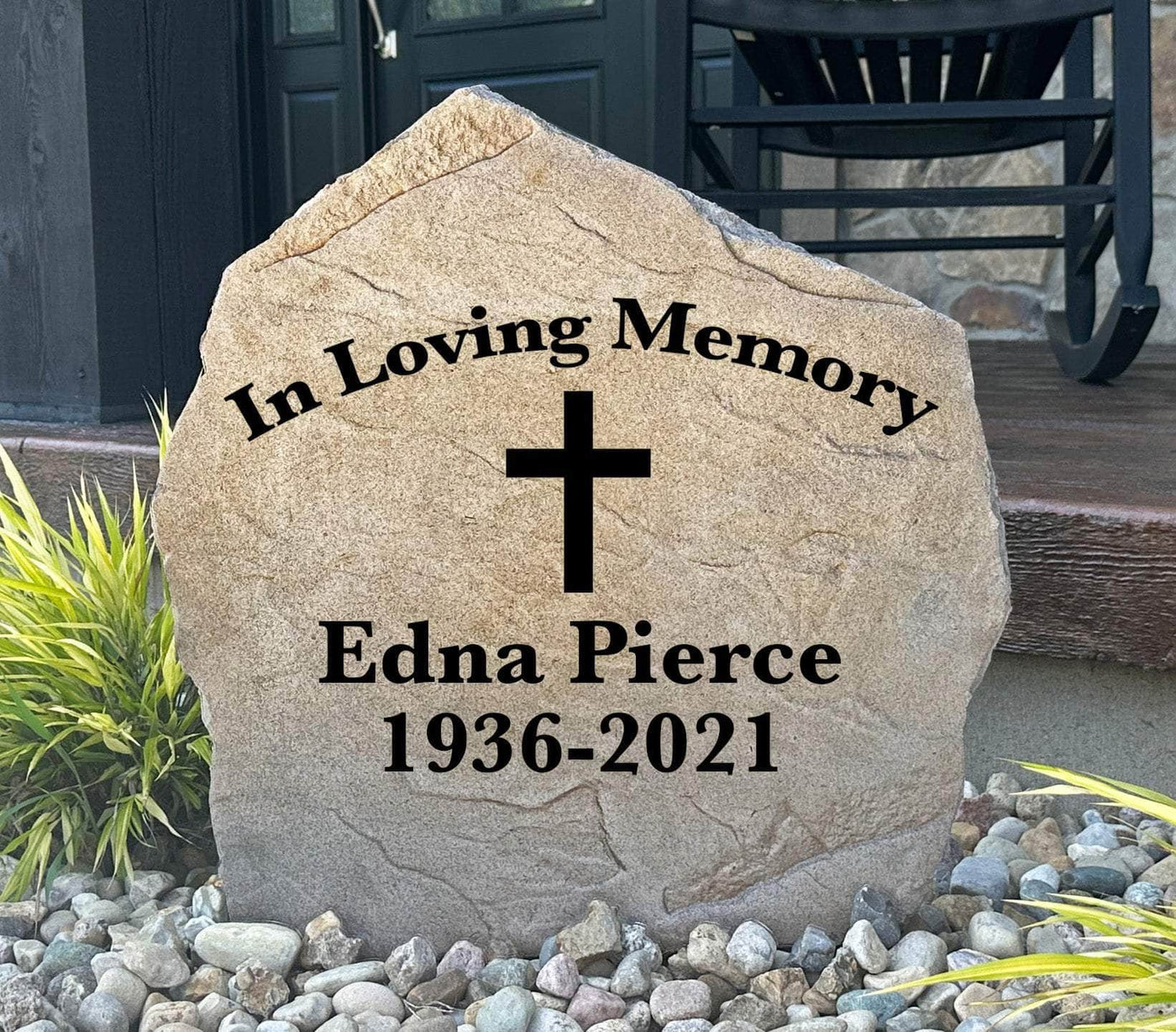 Cross memorial stone engraved with "In Loving Memory" and personalized name.