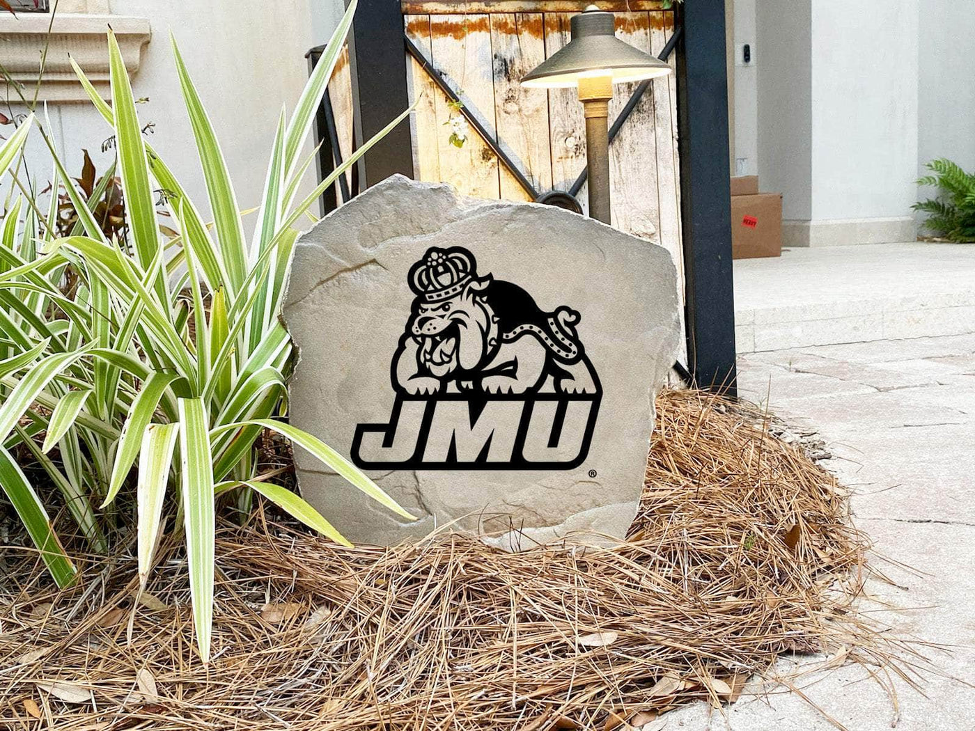 Custom stone with James Madison University mascot and logo