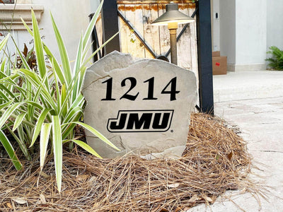 Custom yard rock featuring JMU logo and address