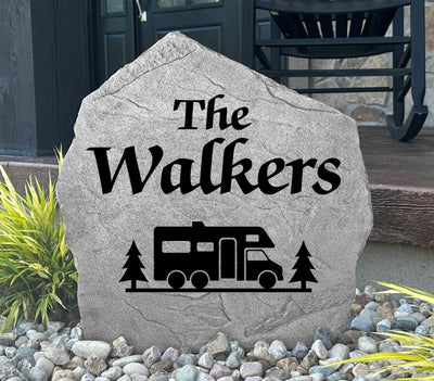 Custom motorhome stone sign featuring engraved name and trees design.