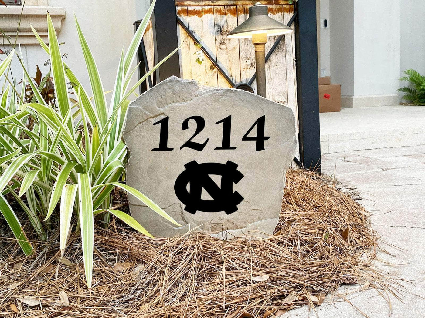 Decorative house number stone with Tar Heels emblem for outdoor display