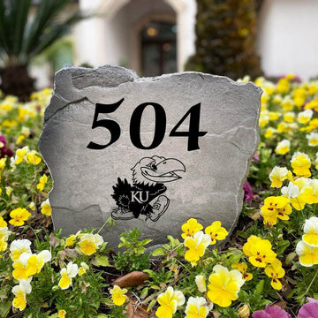 Personalized University of Kansas outdoor address marker engraved into premium stone with authentic Jayhawks graphics. A unique landscaping feature and thoughtful gift for Kansas fans, alumni, and new homeowners.
