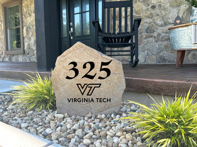 Outdoor address stone showcasing Virginia Tech logo