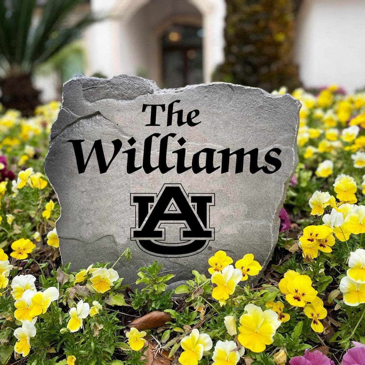 Personalized Auburn Tigers outdoor name stone featuring custom family lettering permanently engraved into weather-resistant stone. A thoughtful gift for college football fans, alumni, weddings, housewarmings, and new homeowners.