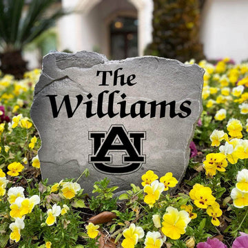 Personalized Auburn Tigers outdoor name stone featuring custom family lettering permanently engraved into weather-resistant stone. A thoughtful gift for college football fans, alumni, weddings, housewarmings, and new homeowners.