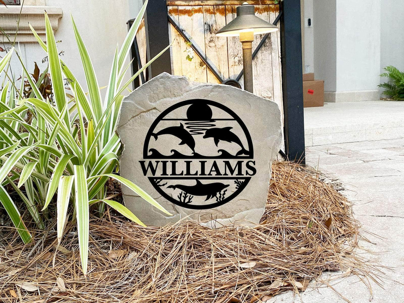 Personalized dolphin stone ideal for coastal homes, gardens, or vacation properties