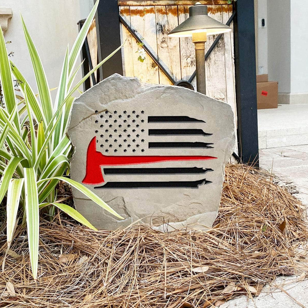 Patriotic Fireman Flag landscape stone designed to recognize courageous firefighters while enhancing gardens, walkways, and residential entryways.