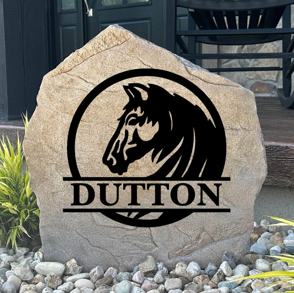 Personalized Horse Monogram Name Stone featuring a custom family name, monogram, and elegant horse design engraved directly into the stone surface. This decorative garden stone adds equestrian charm and curb appeal to front yards, barns, patios, and entryways.