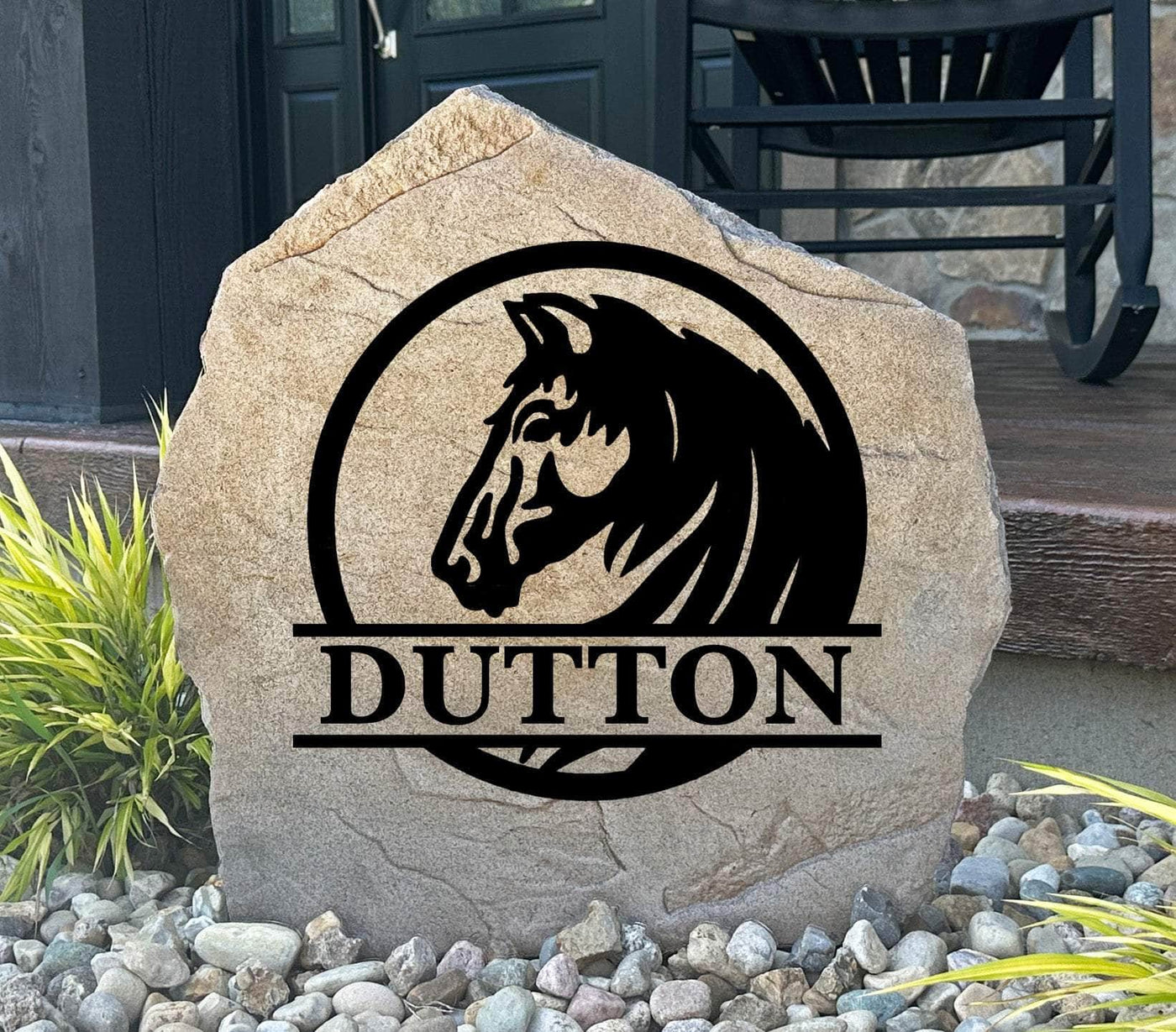 Custom engraved stone with horse logo and family name