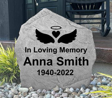 Decorative angel wings remembrance stone crafted from durable concrete, creating a lasting outdoor memorial for family members and dear friends.