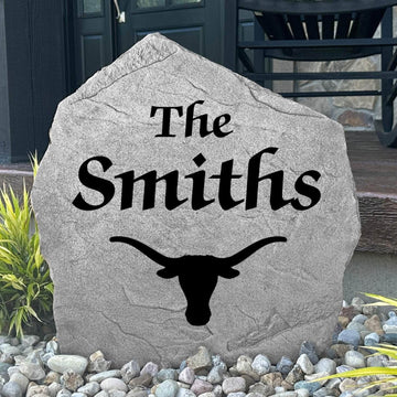 Officially licensed Texas Longhorns family name plaque crafted from durable concrete, showcasing custom engraving with timeless outdoor appeal.