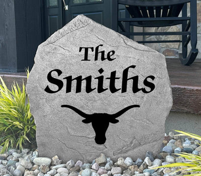 Engraved stone with family name and Longhorn logo