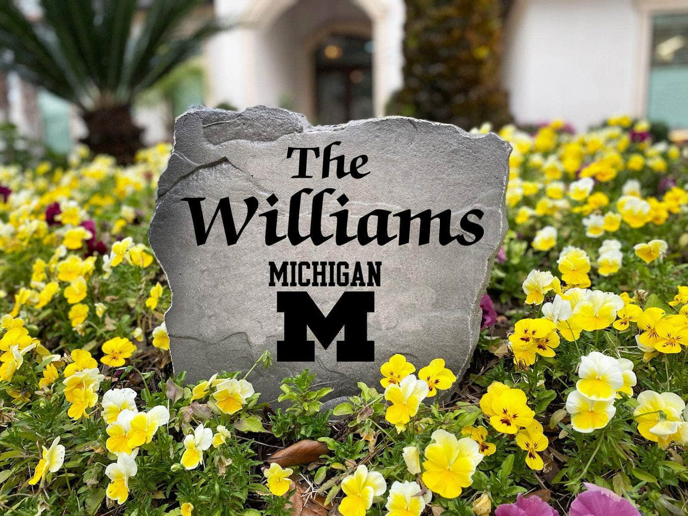 NCAA-inspired engraved stone with Michigan pride, great for outdoor décor.