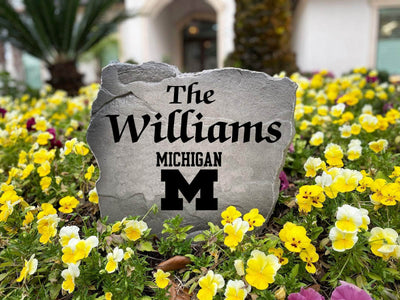 NCAA-inspired engraved stone with Michigan pride, great for outdoor décor.