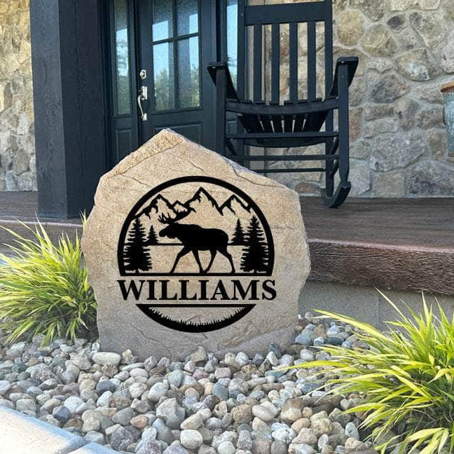 Decorative Moose Monogram Stone featuring a detailed moose design and personalized initial permanently engraved into the stone surface. Perfect for cabin décor, gardens, and outdoor living spaces, this stone adds timeless appeal.