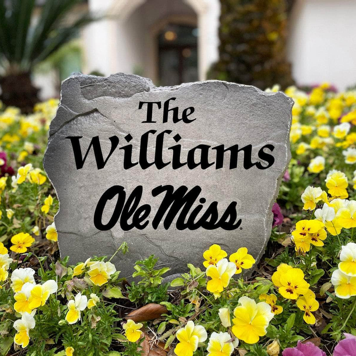 Premium Ole Miss outdoor name stone personalized with your family name and crafted from durable, weather-resistant stone. An ideal gift for alumni, graduates, college football fans, weddings, and housewarmings.