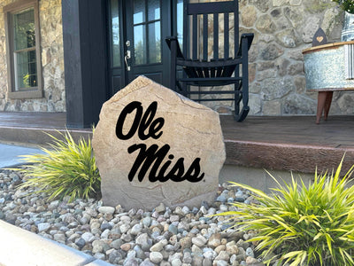 Custom outdoor Ole Miss logo stone sign for personalized home or garden decor.
