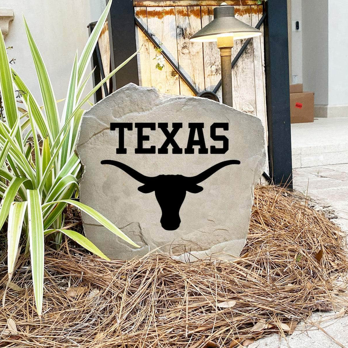 Texas Longhorns concrete logo plaque crafted from durable concrete, showcasing legendary school pride with timeless outdoor style and lasting beauty.