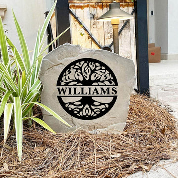 Decorative Tree of Life landscape stone featuring a personalized monogram, perfect for enhancing flower beds, walkways, and residential curb appeal.