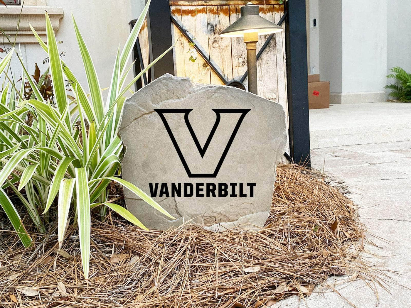 Custom landscaping stone with Vanderbilt University logo design
