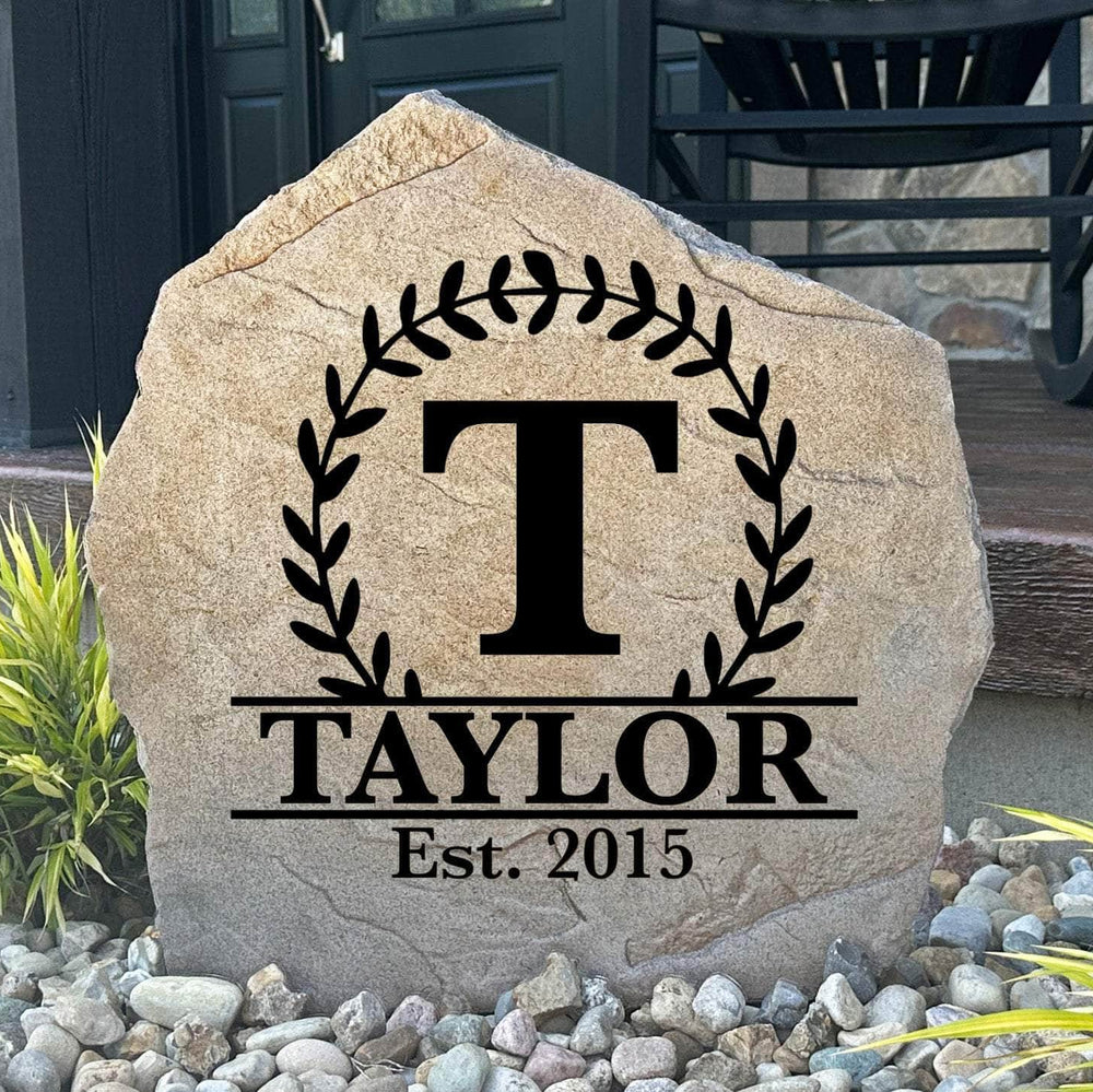 Custom vine monogram plaque featuring an elegant family name and established year, crafted from durable concrete for lasting outdoor beauty.