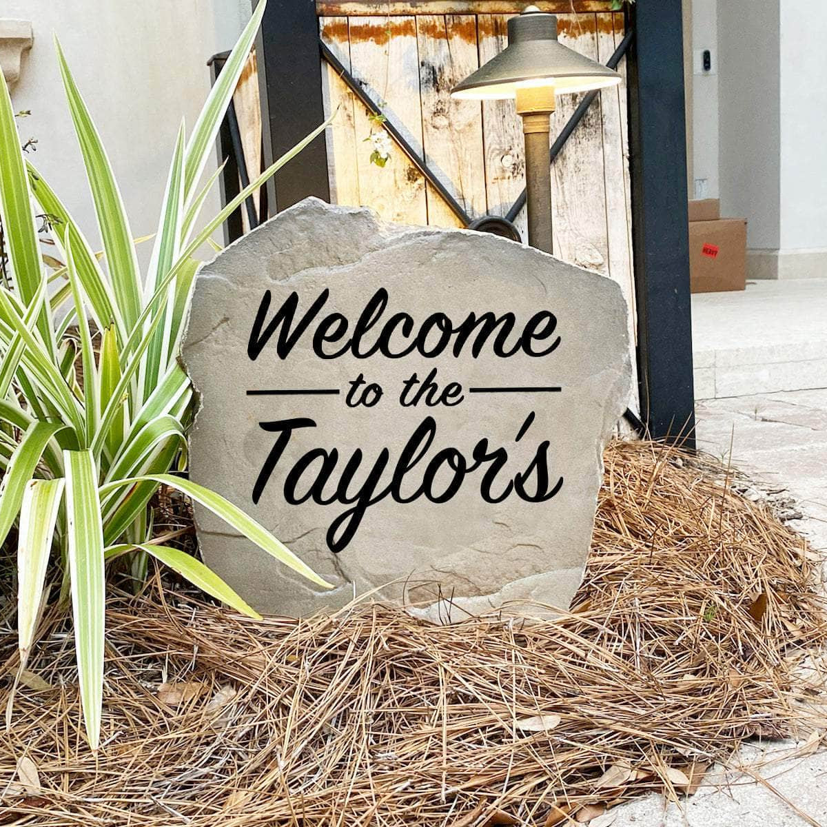 Decorative Welcome Name landscape stone featuring personalized engraving, perfect for enhancing curb appeal with a friendly first impression.