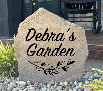 Personalized garden stone engraved with garden name sign.
