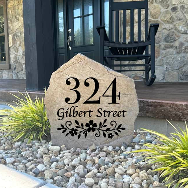 Engraved Floral Address Stone featuring personalized house numbers and decorative floral detailing, creating a beautiful and functional address marker for the home. This custom address stone is permanently engraved into the surface for lasting durability and enhances curb appeal in front yards, garden beds, driveways, walkways, and entryways. Perfect for homeowners seeking elegant outdoor décor and easy-to-read house numbers.