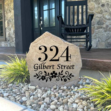 Engraved Floral Address Stone featuring personalized house numbers and decorative floral detailing, creating a beautiful and functional address marker for the home. This custom address stone is permanently engraved into the surface for lasting durability and enhances curb appeal in front yards, garden beds, driveways, walkways, and entryways. Perfect for homeowners seeking elegant outdoor décor and easy-to-read house numbers.
