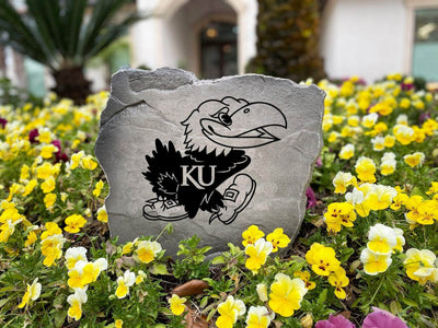 Outdoor rock displaying University of Kansas Jayhawk mascot