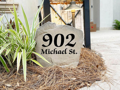 Engraved elegant house number stone in classic style for outdoor display